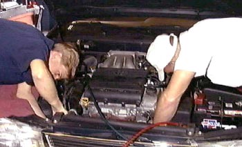 Students working on a car